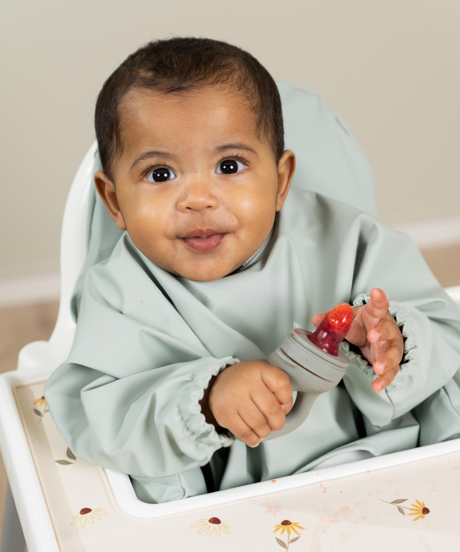 Smekke med ermer og lomme - Green dream Knatteplock