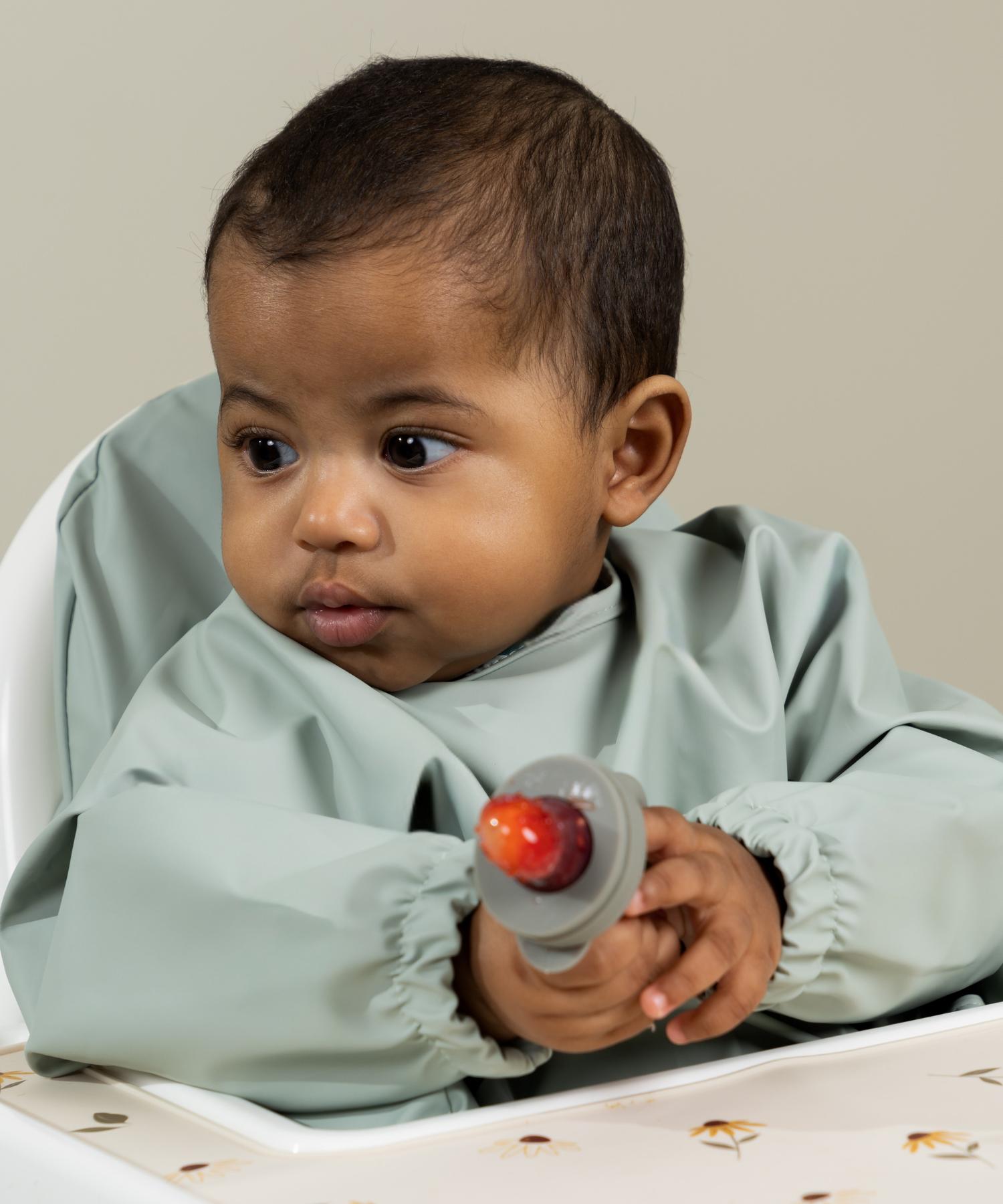 Smekke med ermer og lomme - Green dream Knatteplock